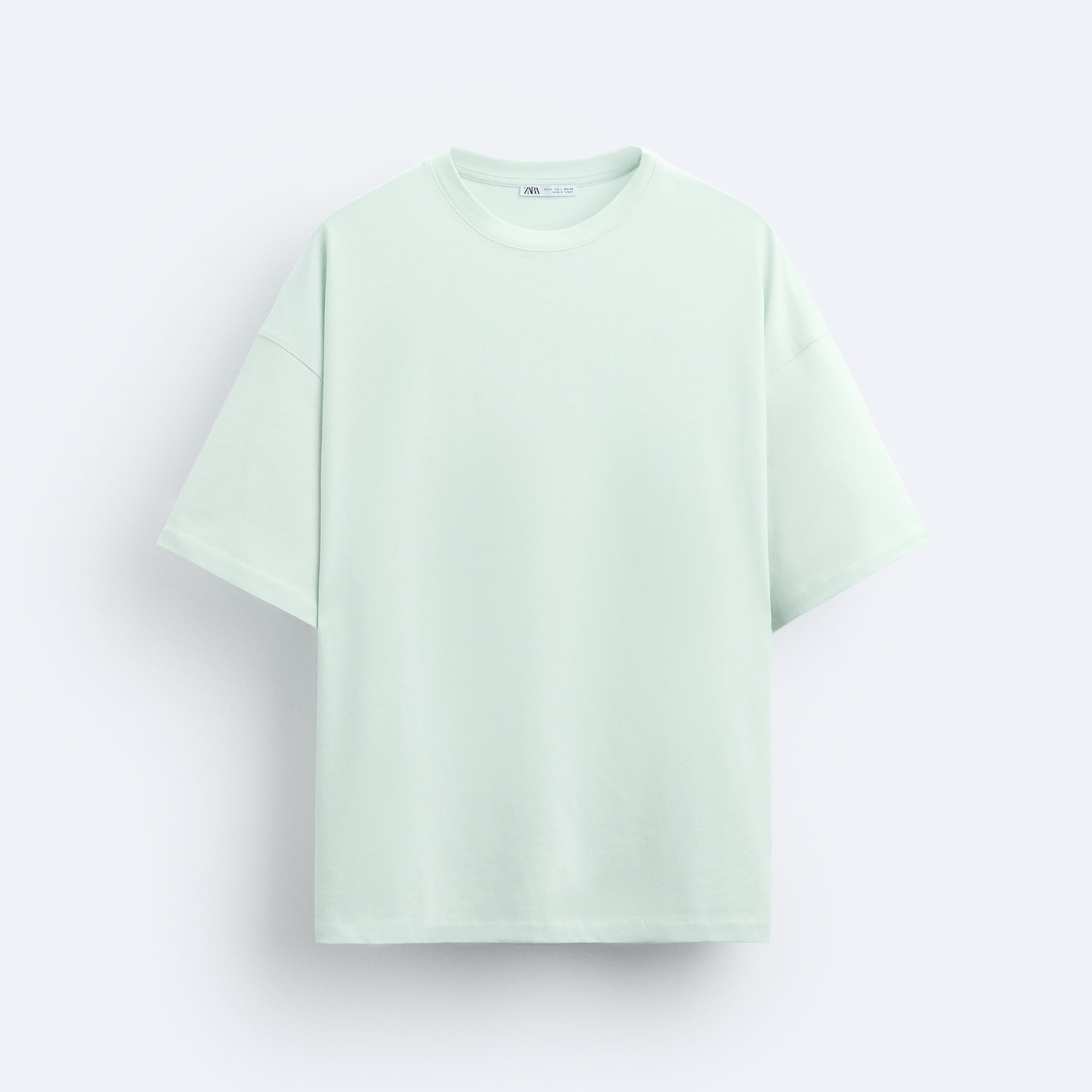 Zara T-Shirt Com Mensagem Reativa á Luz Solar
