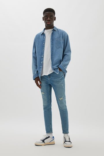 Pull&amp;Bear Jeans carrot fit básicas com rasgões