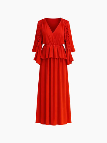 Vestido fluido com folhos e acabamento franzido